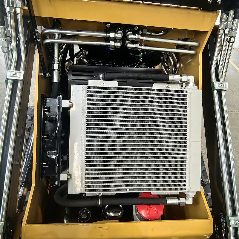 Tela-alustainen mini-liukukuormaaja