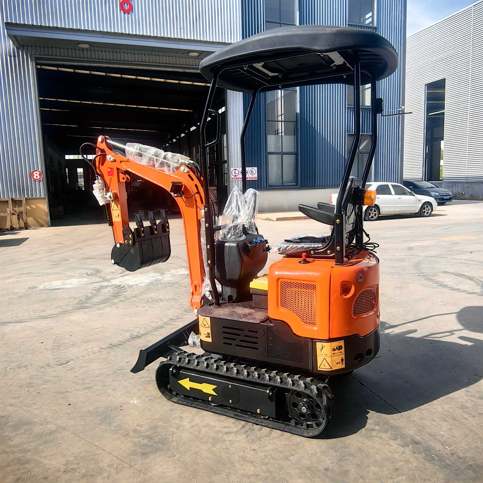 Liten bandgrävmaskin