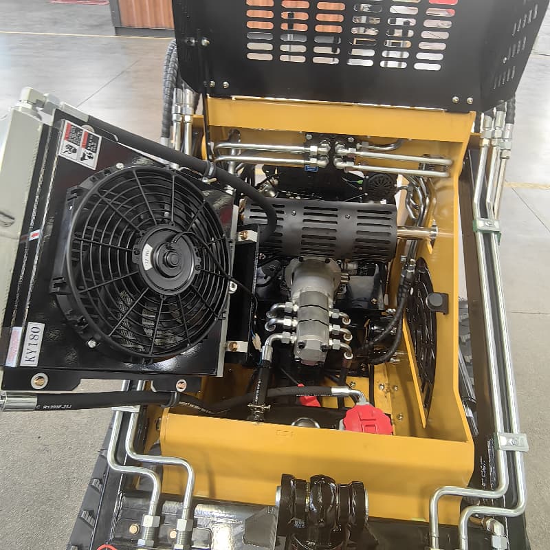 Tela-alustainen mini-liukukuormaaja